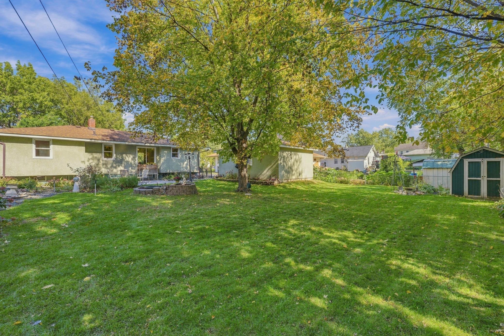 A shed and plenty of green space for play or extended gardens.
