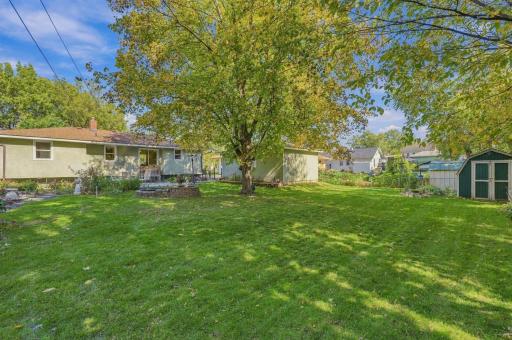 A shed and plenty of green space for play or extended gardens.