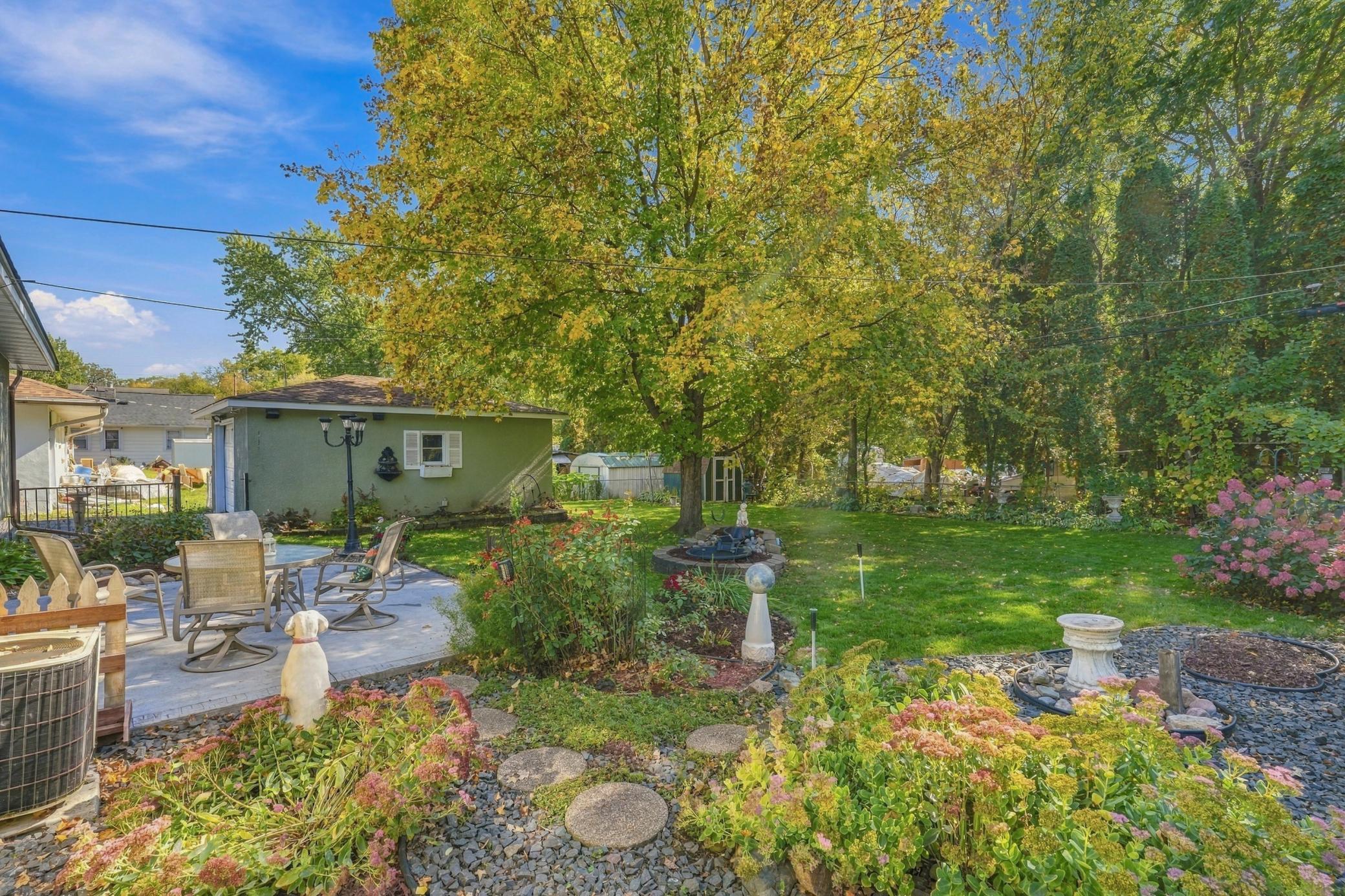 The mature trees add a privacy and additional color.