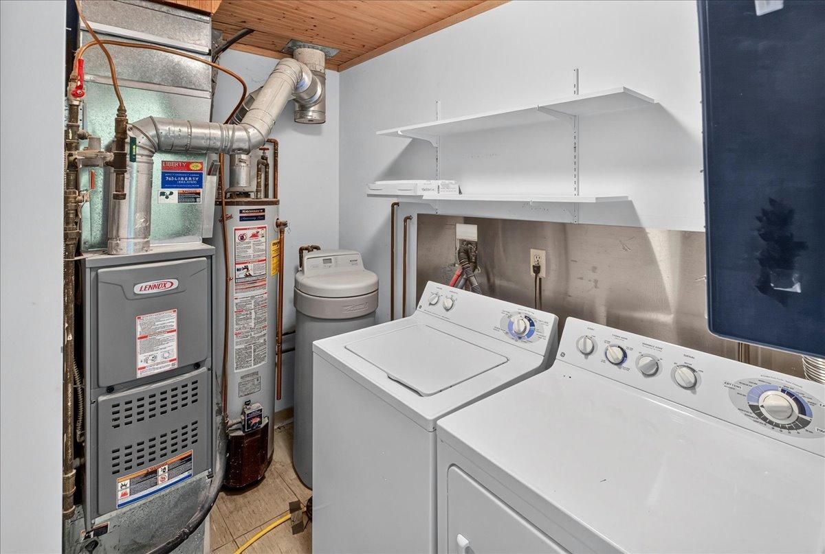Laundry room with utilities