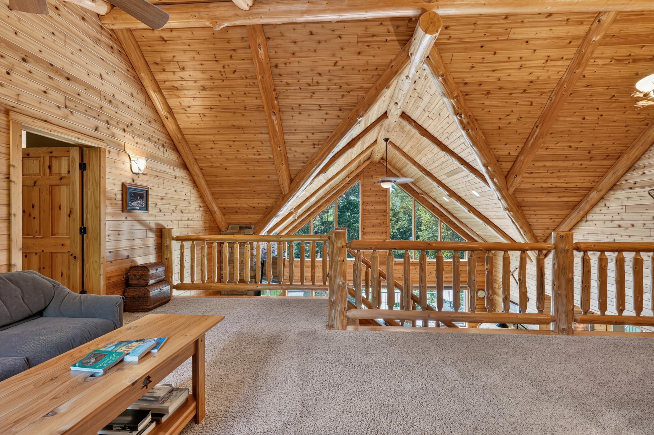 Upper level family room looks out over the main level.