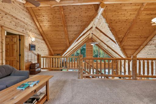 Upper level family room looks out over the main level.