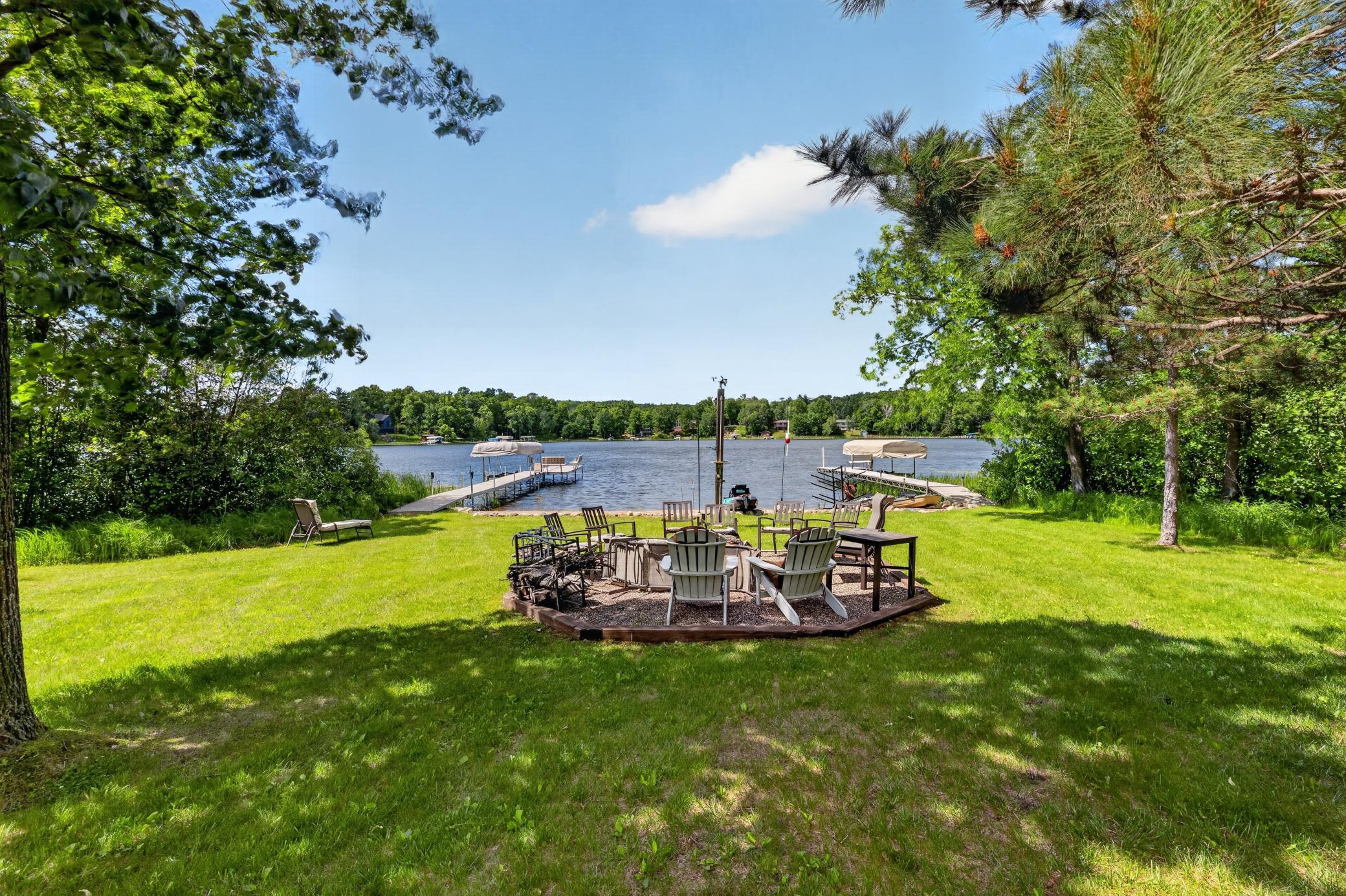 Beautiful custom fire ring by the lake.