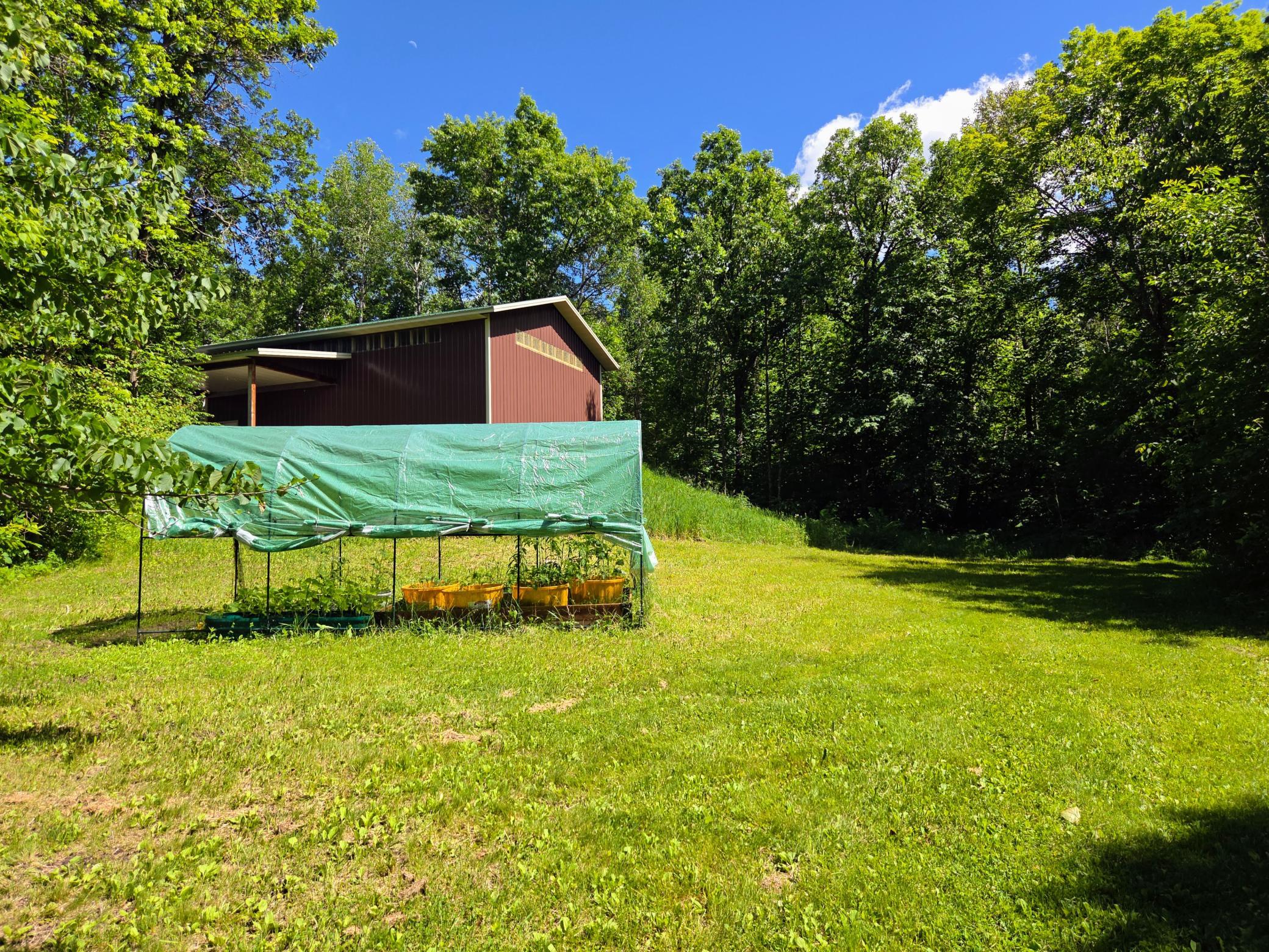 Great sunny spot for a garden with plenty of room for trailer parking.