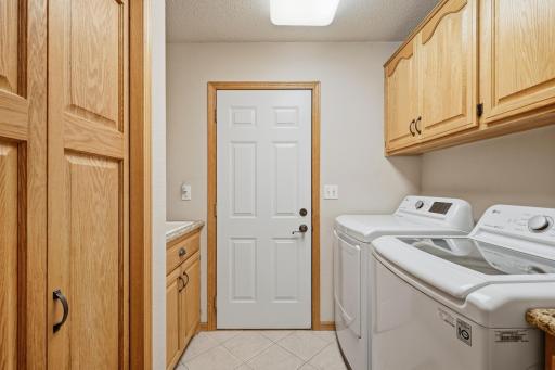 Handy main floor laundry leading to the garage.