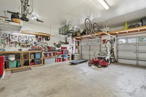 3 stall insulted, heated, finished garage with tons of storage.