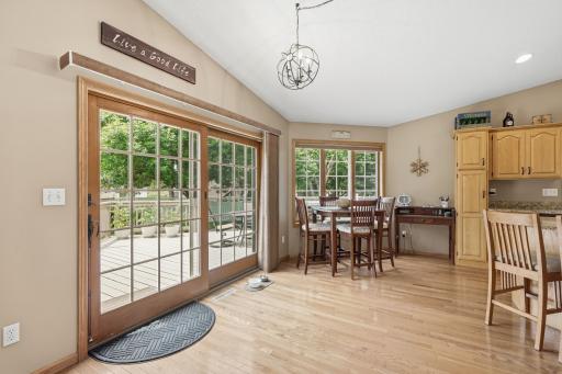 Bright sunny dining area with sliding door leading to the back patio.