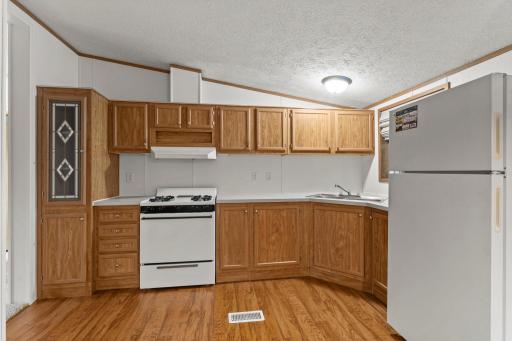 Vaulted ceiling and plenty of space for cooking makes this kitchen shne.