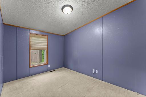 With the two additional bedrooms on the opposite side of the house from the primary suite, privacy is assured.