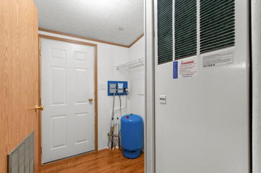 With a door to the backyard, you have easy outside access from the utility room.