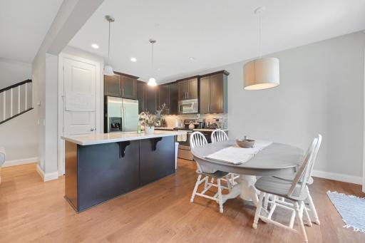 Dining area has plenty of room for a larger table.