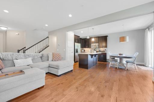 Such an inviting main level! Wood floors, gas fireplace, and a gorgeous kitchen.