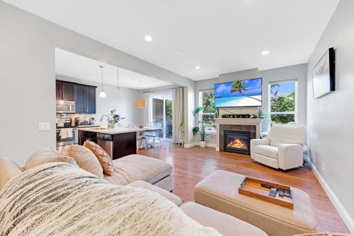 The main level is open and comfortable. You'll love all the daylight, the fireplace, and the convenient access to the patio.