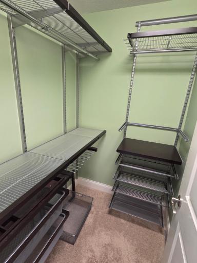 OK, this picture is not nearly as fancy as our professional shots, but the modular shelving system in the primary bedroom was worth showing. Flex it to fit your needs!
