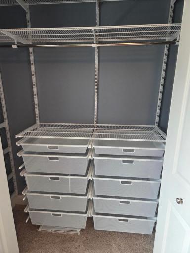 See what I mean? This shelving organizer is a helpful addition to the closet in the 2nd bedroom.