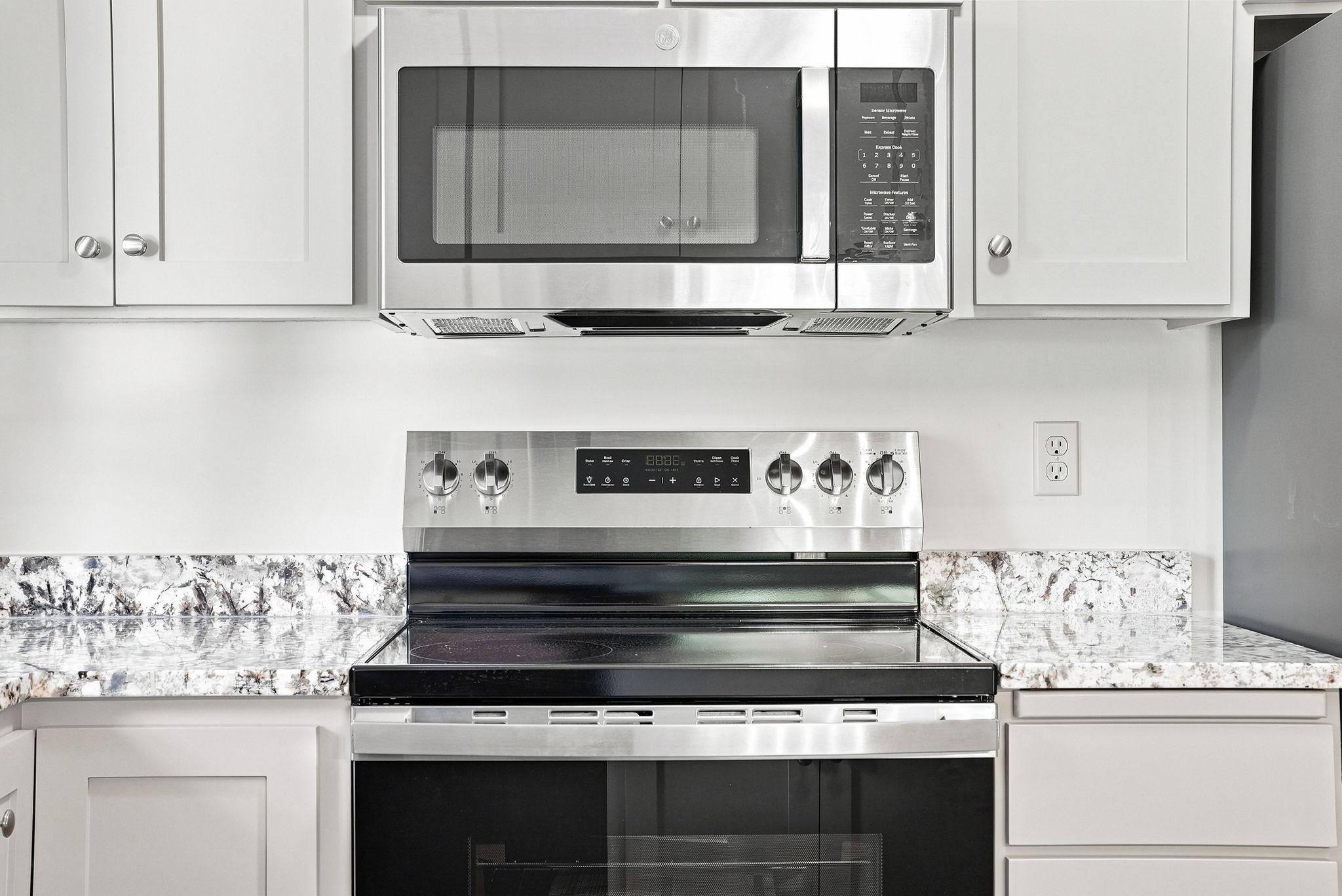 The stainless appliances are new