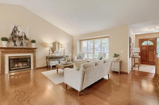 The open layout flows effortlessly from room to room, creating a warm and functional space that's perfect for both everyday living and entertaining. Whether you're enjoying a quiet evening by the fire or hosting guests, this home is great for both