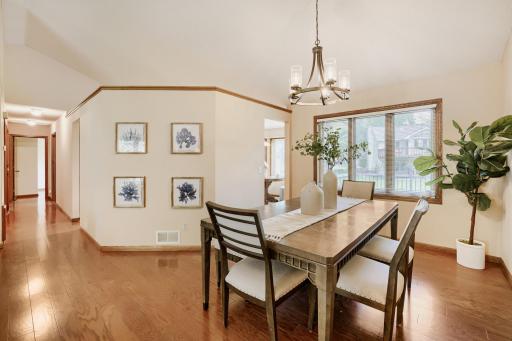 Conveniently located just off the kitchen, the dining area provides an effortless flow for entertaining and everyday meals. There's plenty of room for a full-size dining table, making it easy to host family gatherings or special occasions.