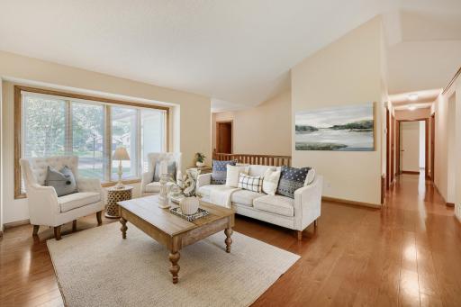 Large windows fill the space with natural light while providing peaceful views of the surrounding yard and don't forget this home offers all living facilities on one level.