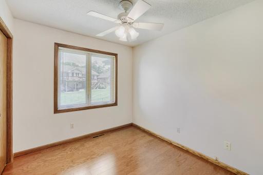 The two additional main-level bedrooms offer comfortable, versatile spaces that can easily adapt to your lifestyle. Both rooms feature beautiful hardwood floors, large windows that bring in abundant natural light, neutral dÃ©cor & ceiling fans,