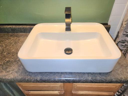 Attractive sink above counter sink design.