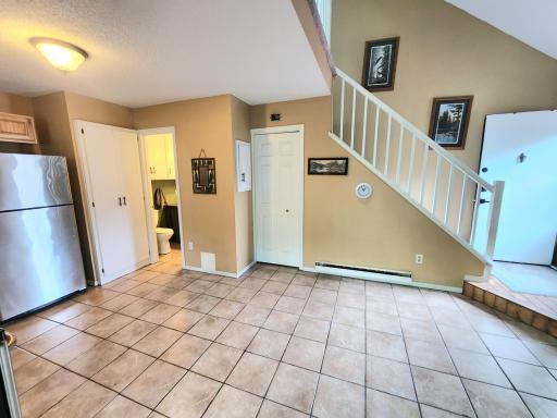 View towards full bath and stairs to you bedroom loft.
