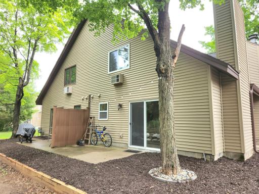 Your own private patio overlooking the adjoining wooded area.
