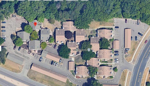 Aerial view of Lofts at Sand Creek complex showing guest parking on the east end(right on this photo)