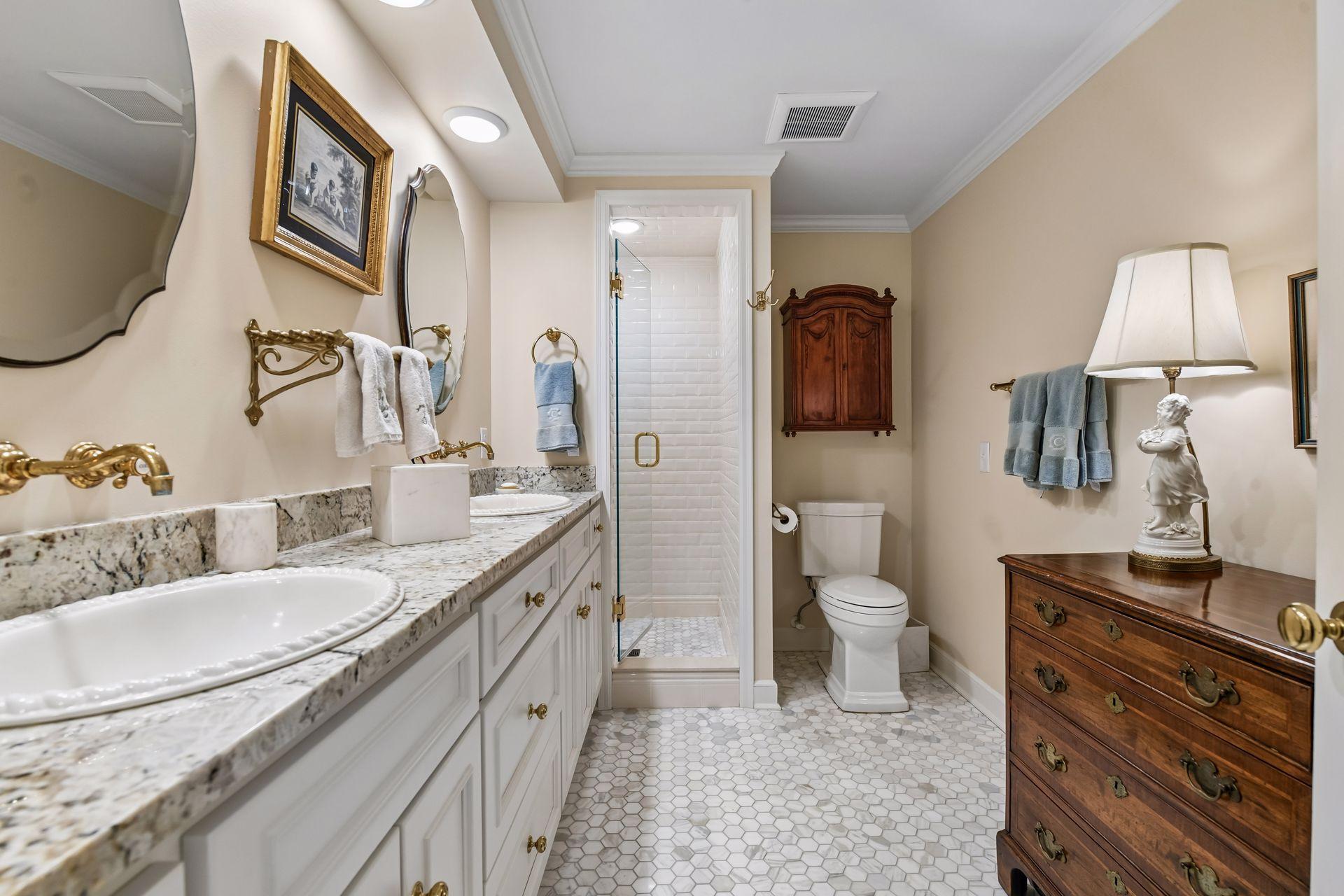 Lower level 3/4 bath with double vanity
