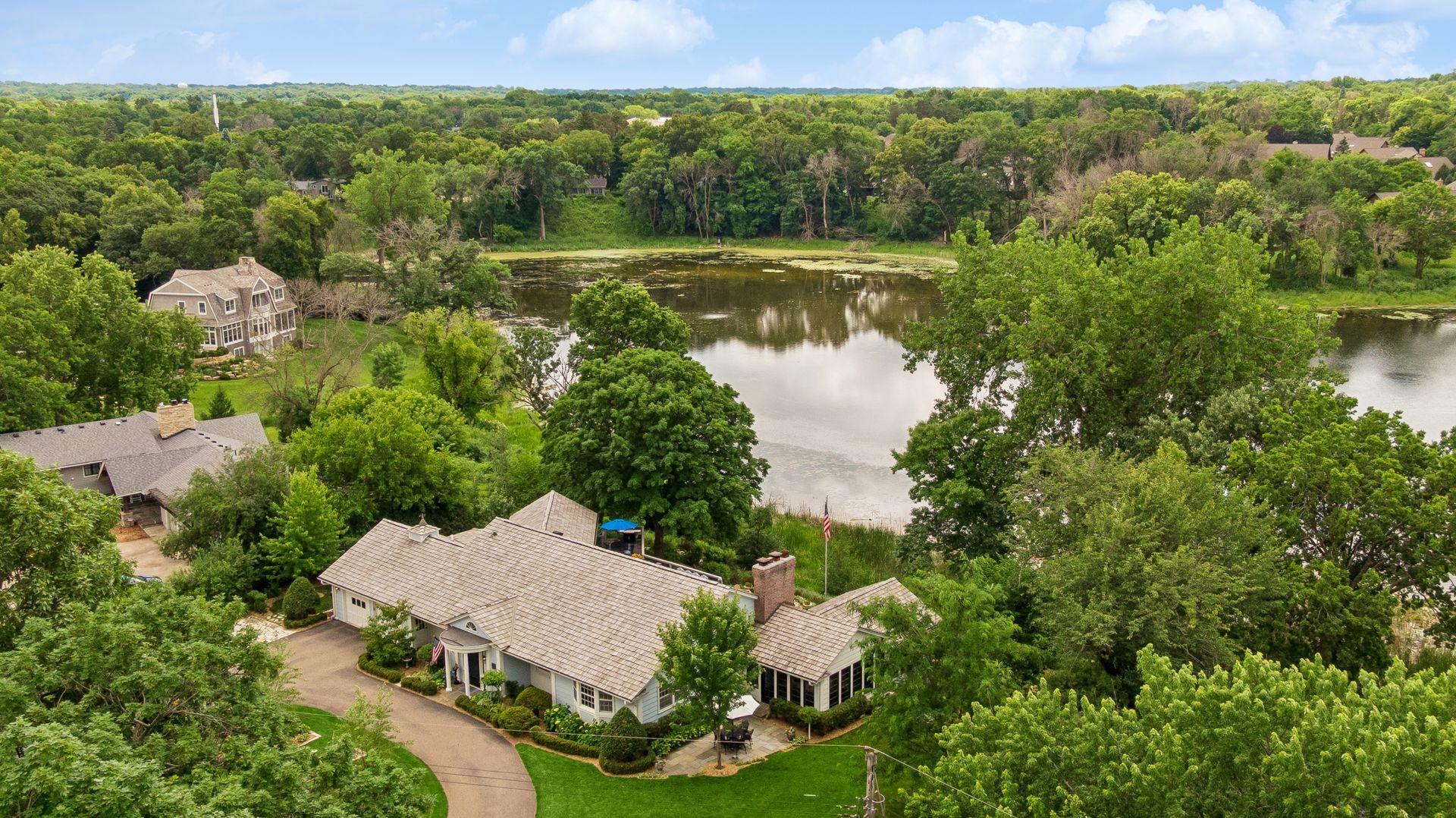Storybook Setting on a Lake, Perfect Location, Complete Redmodel, and so much more!
