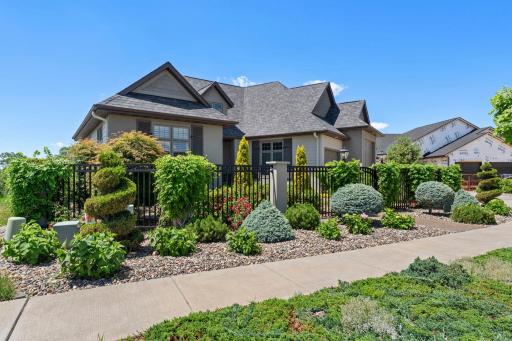 An extraordinary custom-designed home showcasing exceptional craftsmanship and effortless, maintenance-free living inside and out.