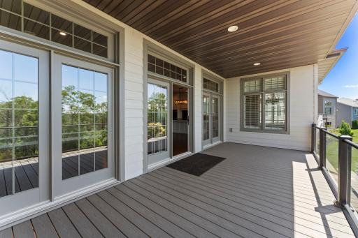 Trex Transcend maintenance-free decking paired with tempered, crystal-clear glass railings creates a sleek, durable outdoor space designed for low-maintenance living and uninterrupted views.