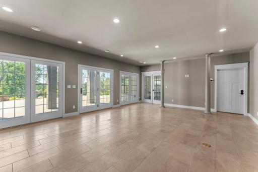 Family room leads out to the courtyard, creating a seamless indoor-outdoor connection that enhances everyday living and entertaining. The direct access extends the living space outdoors, offering an inviting transition to additional gathering spaces