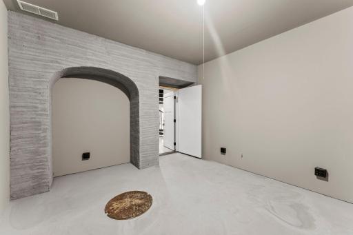 Inspired by a New Orleans vision, this space was originally designed as a sound studio but can also serve as a media room or man cave. The room is soundproof, offering an ideal setting for entertainment or creative use.