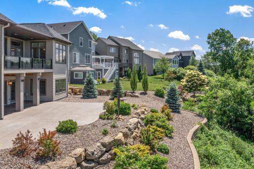 Front and back landscaping was carefully selected for a beautiful, low-maintenance design. All trees are dwarf varieties, including three Blue Spruce (âPicea pungens âFat Albertââ) with a mature height of 15 to 25 feet.