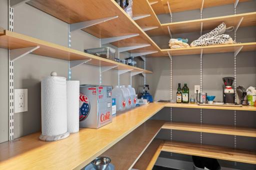A spacious, well-appointed pantry offering abundant storage and convenient organization.