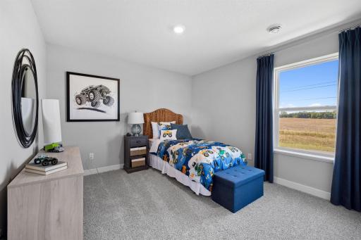 Third Bedroom. Photo of model home, colors and finishes will vary.