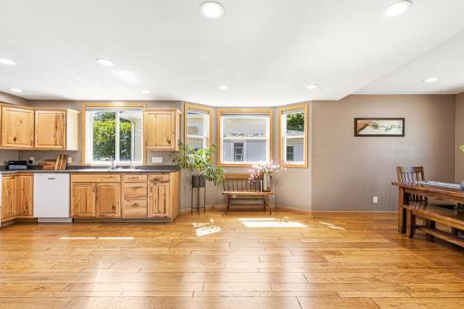 The kitchen / dining area offers so much BONUS space for a movable island, kitchen expansion, or a LARGE family-sized table!