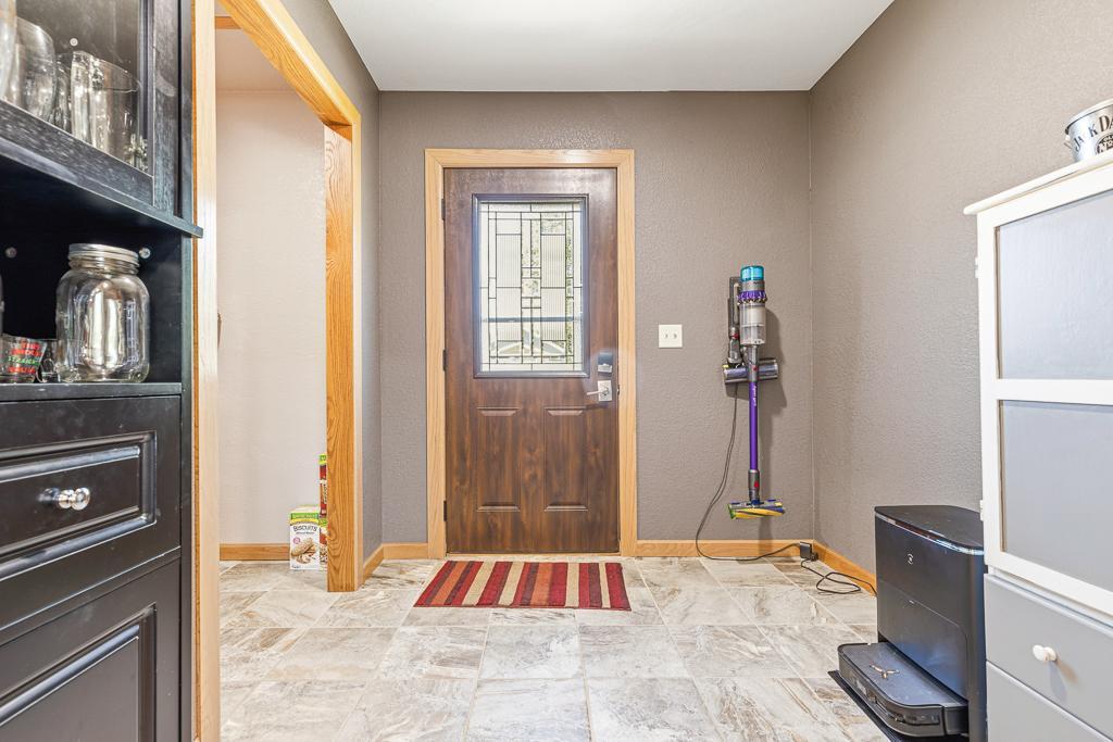 The front entry of the home features wonderful space and a LARGE closet!