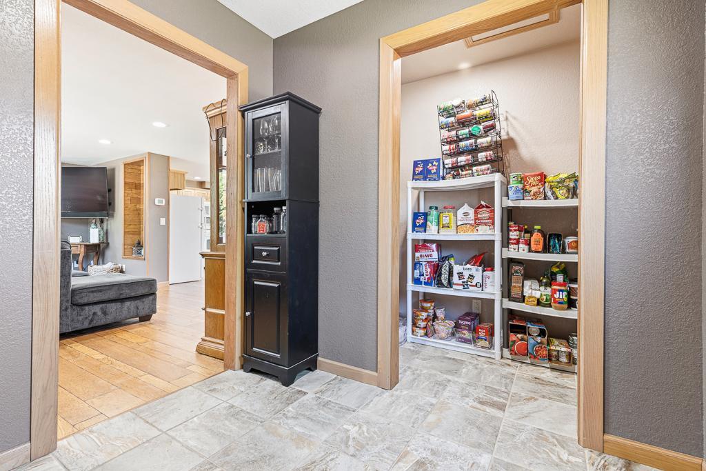 The closet space in the front entry is currently being used as a pantry.. however, there are laundry hookups in this space, too!
