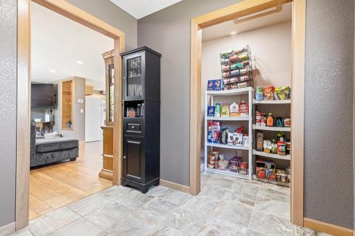 The closet space in the front entry is currently being used as a pantry.. however, there are laundry hookups in this space, too!