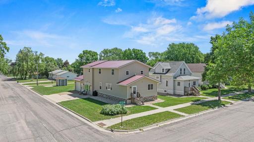 Large corner lot with great yard space, a storage shed, and multiple patio areas!