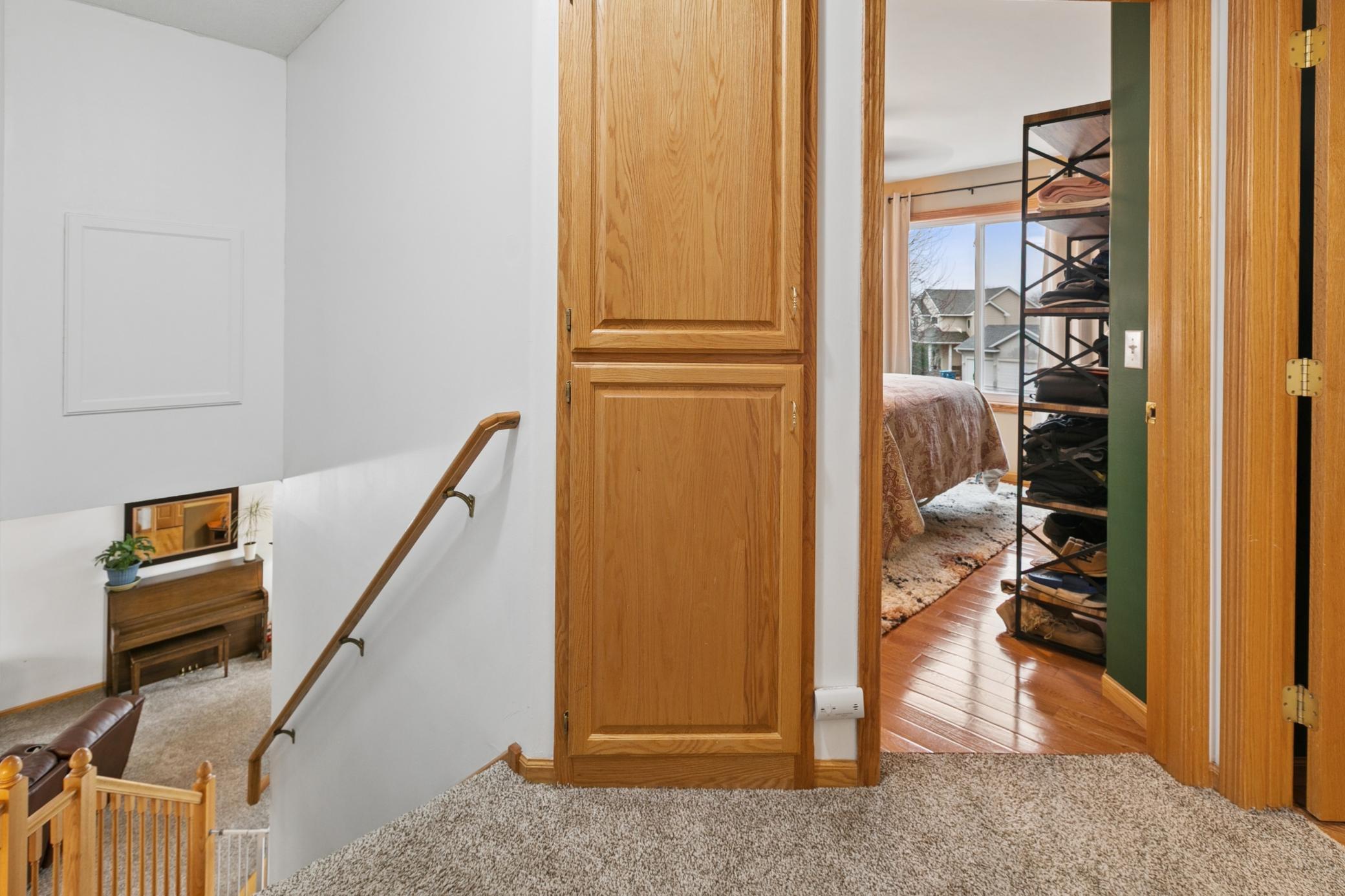 Upper Level Hall with View Down to the Living Room