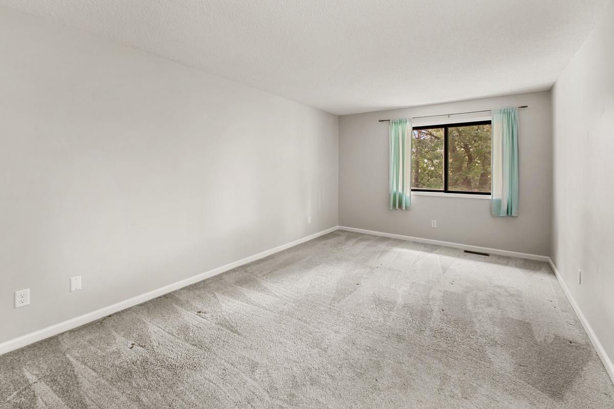 Large owners suite large enough for large furniture and work out gear.