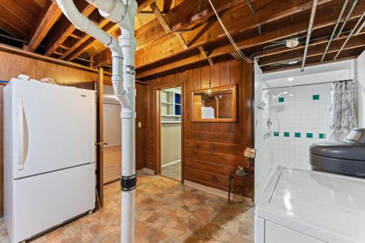 Laundry room and bathroom. The refridgerator stays with the home.