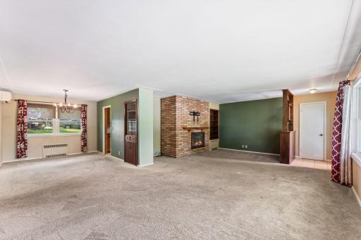 Hardwood floors can be found under the carpet.