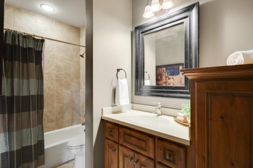 The guest bedroom ensuite bathroom with heated floors