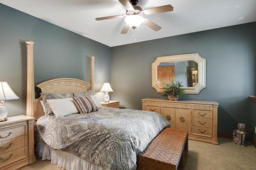A private guest suite includes its own full bathroom with heated tile floors