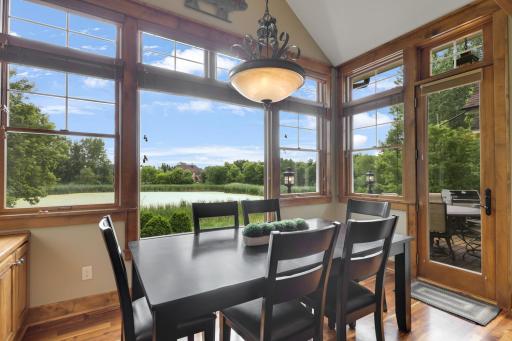 A spacious informal dining area with direct access to the main level deck.