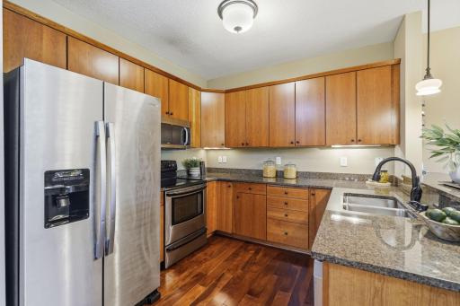 Plenty of counter space, cabinets and double sink